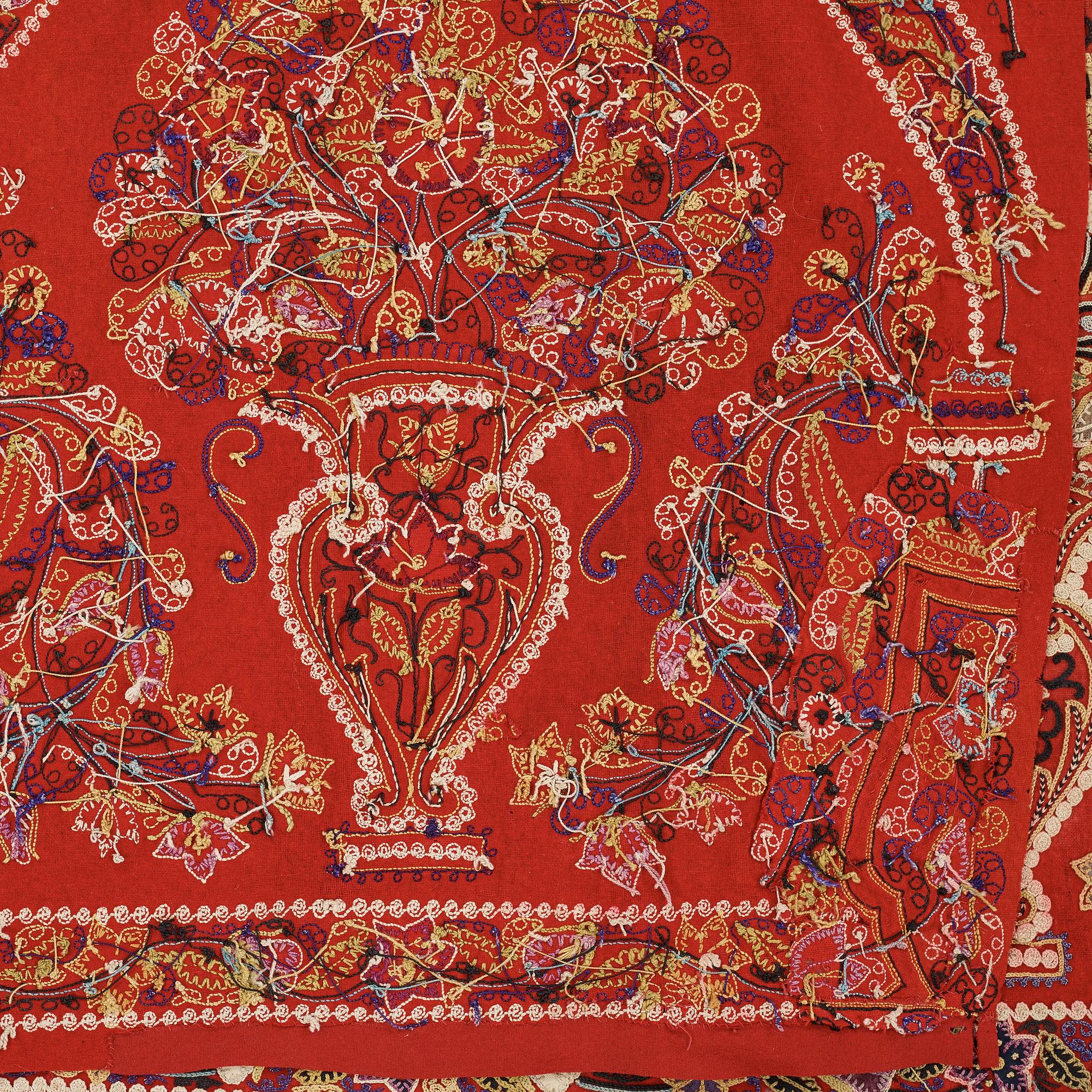 AN EMBROIDERY, antique Rascht, Persia (Iran), late Qajar dynasty, ca  55 - 57,5 x 209,5 - 215 cm.