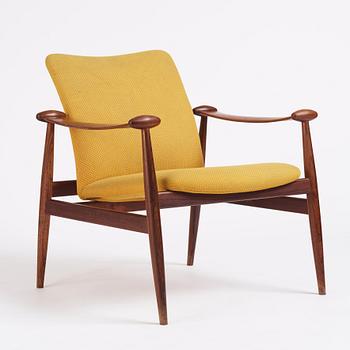 Finn Juhl, a 'model F-133' rosewood easy chair by France & Son, Denmark 1960s.