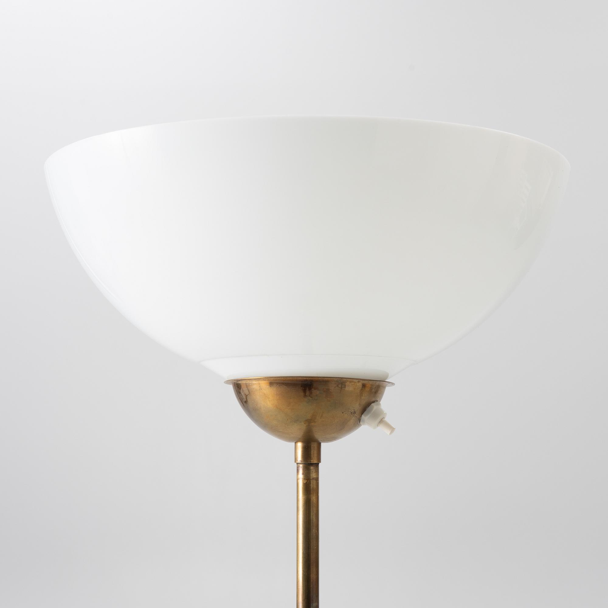 A brass floor lamp, Sweden, mid 20th century.