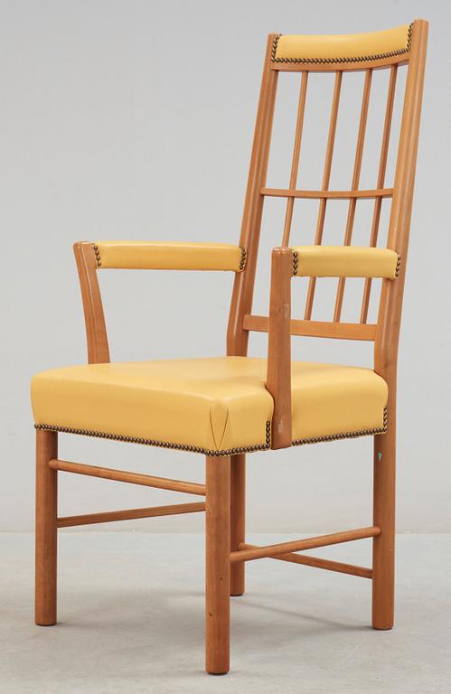 A Josef Frank cherry and yellow leather armchair, Svenskt Tenn, model 652.