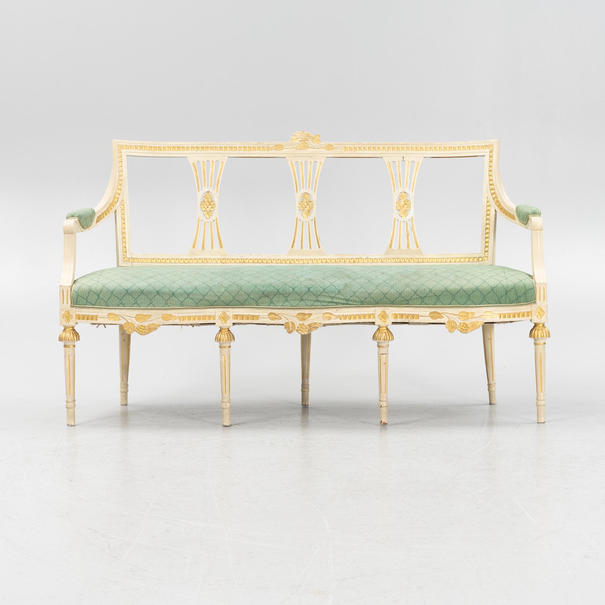 A painted and carved Gustavian style sofa, 1920's.
