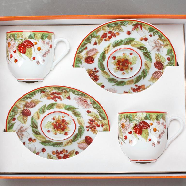 HERMÈS, a pair of porcelain coffecups with plates, "Le Jardin de Pythagore".