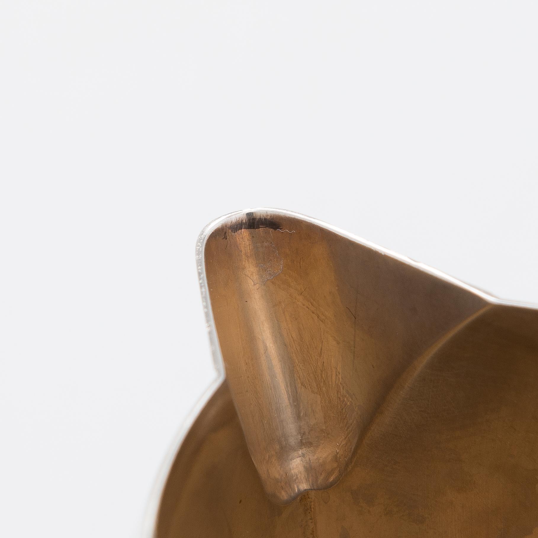 Pekka Piekäinen, a sterling silver cream jug and sugar bowl, J.A. Tarkiainen, Helsinki 1989.