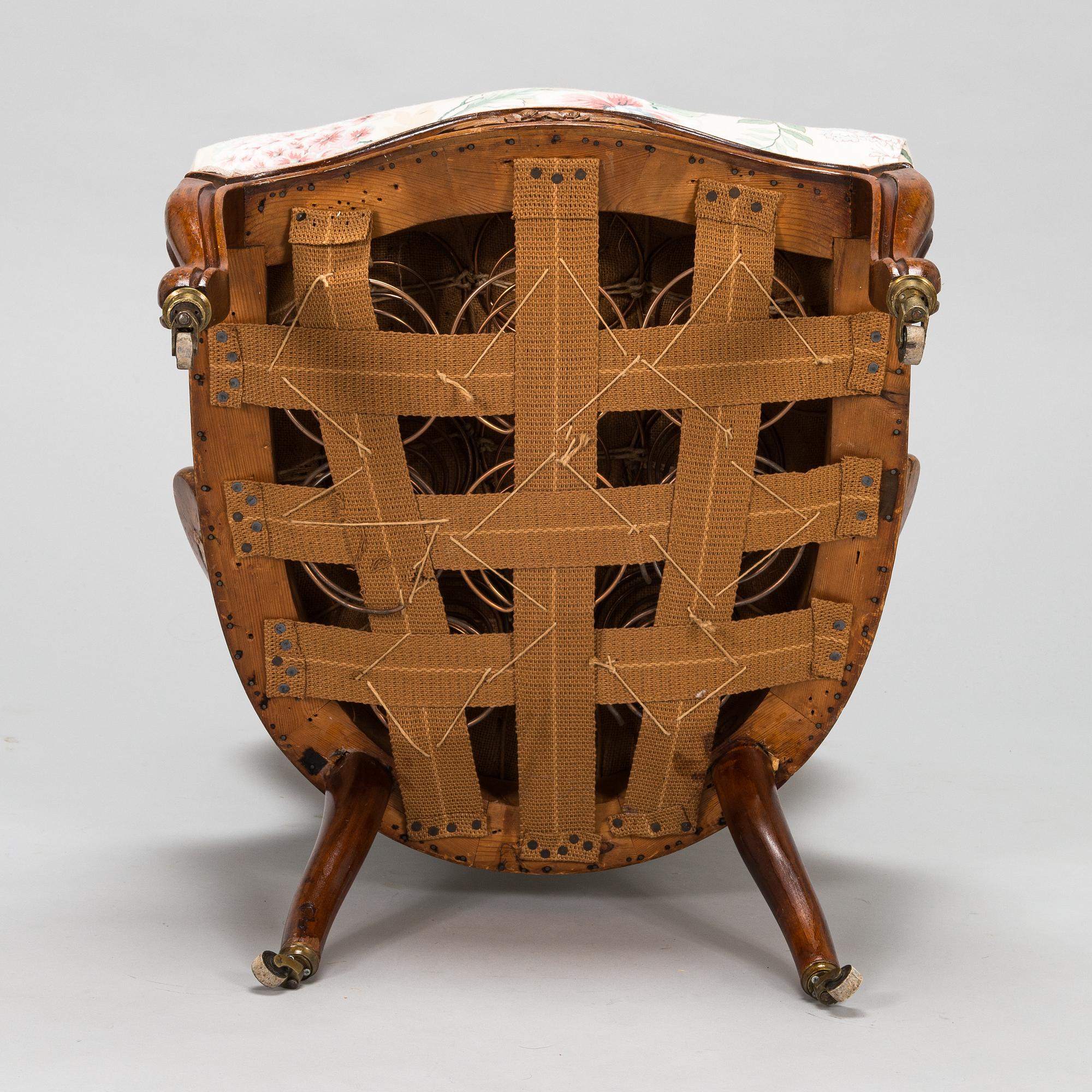 A late 19th century armchair in Rococo style.