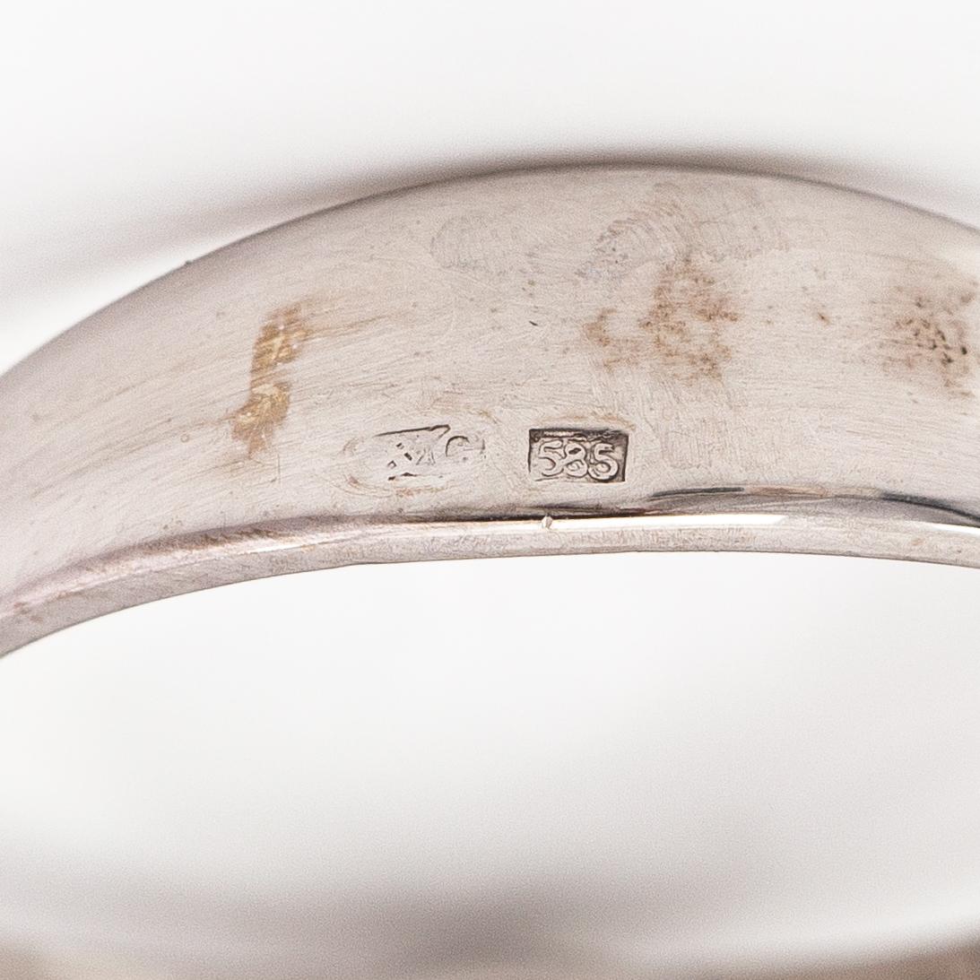 Sormus, 14K valkokultaa, moissaniitti n. 1.50 ct ja timantteja n. 0.12 ct yht. GRA-todistus.