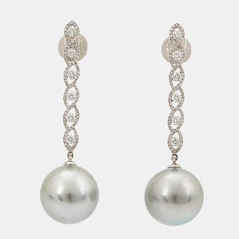 878. A pair of 18K white gold earrings set with Tahitian cultured pearls and round brilliant-cut diamonds.