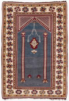 An Anatolian carpet, c. 145 x 103 cm.