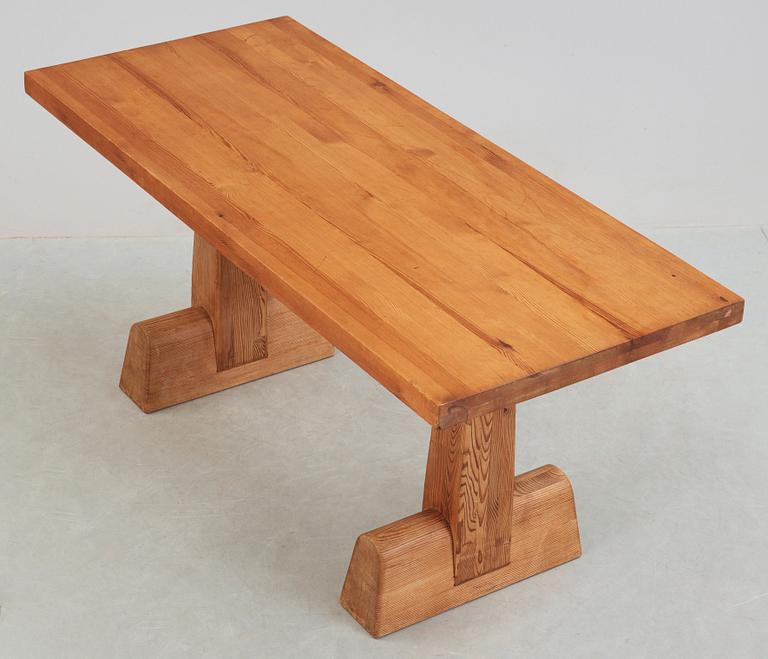 An Axel Einar Hjorth 'Utö' stained pine table, Nordiska Kompaniet, Sweden 1930's.