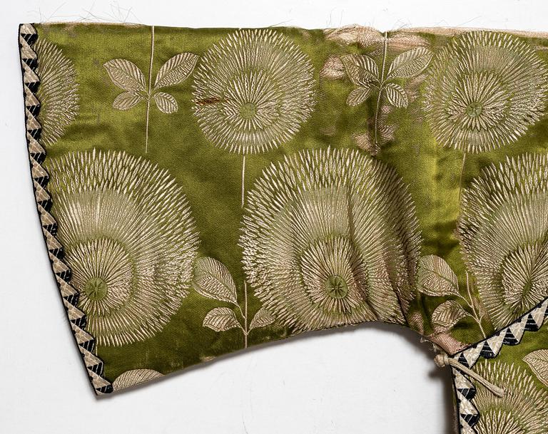 A Japanese silk brocade and fur childrens jacket, Meiji (1868-1912).