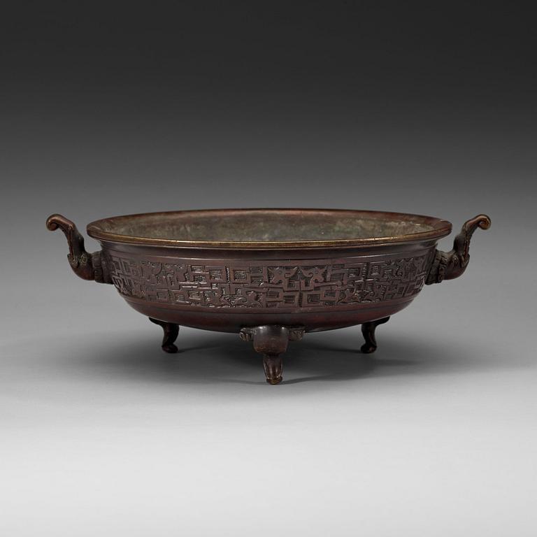 A bronze tripod censer, Qing dynasty (1644-1912), with Xuande six character mark.