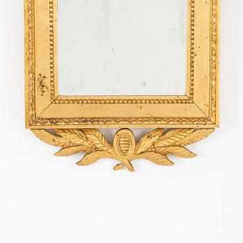 A Gustavian style mirror, first half of the 20th Century.