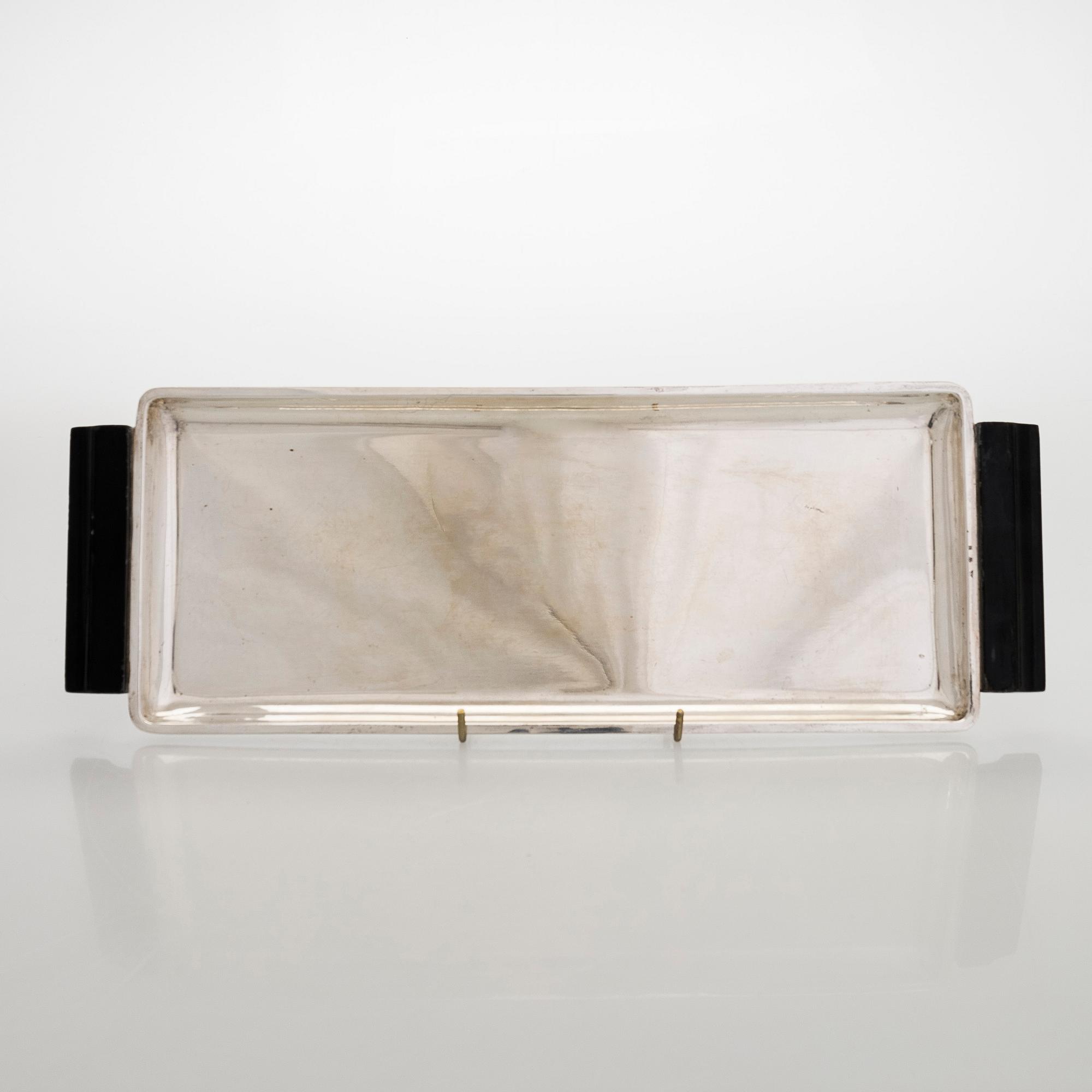 A tray with ashtrays, silver and glass, Czechoslovakia 1942-1945.