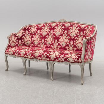 A 18th century rococo sofa.