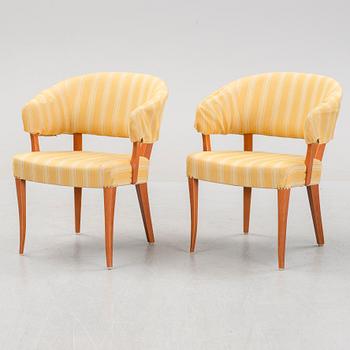 Carl Malmsten, a pair of 'Lata Greven' easy chairs, OH Sjögren, and a 'Berg' table, second half of the 20th Century.