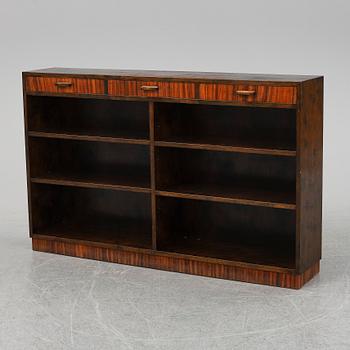 A 1930's stained birch bookshelf.