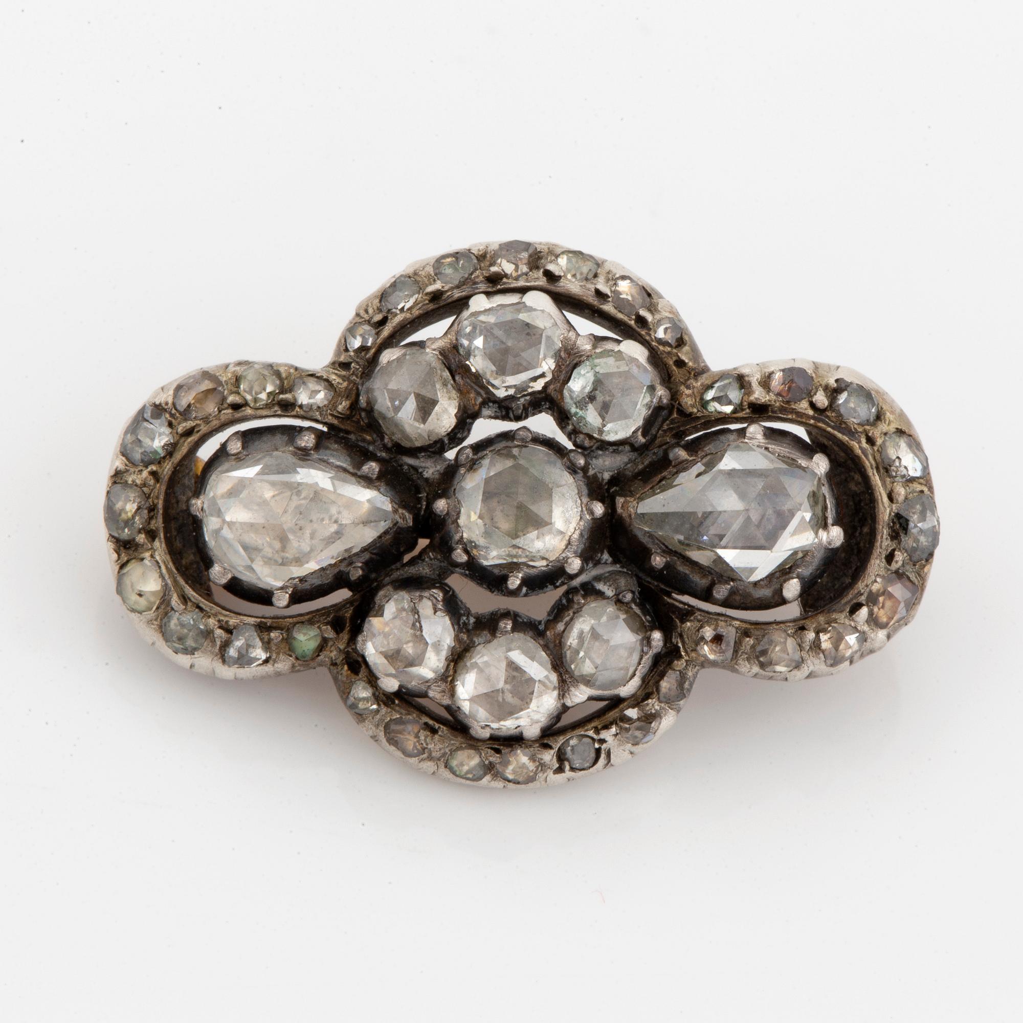 Silver and gold and rose-cut diamond brooch.