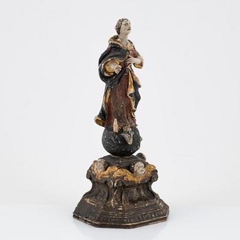 A carved and painted figure of the Virgin Mary crushing the Serpent, Southern Europe, 18th/19th century.
