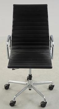 A Charles & Ray Eames 'Aluminium group' office chair, Vitra, model EA 119.