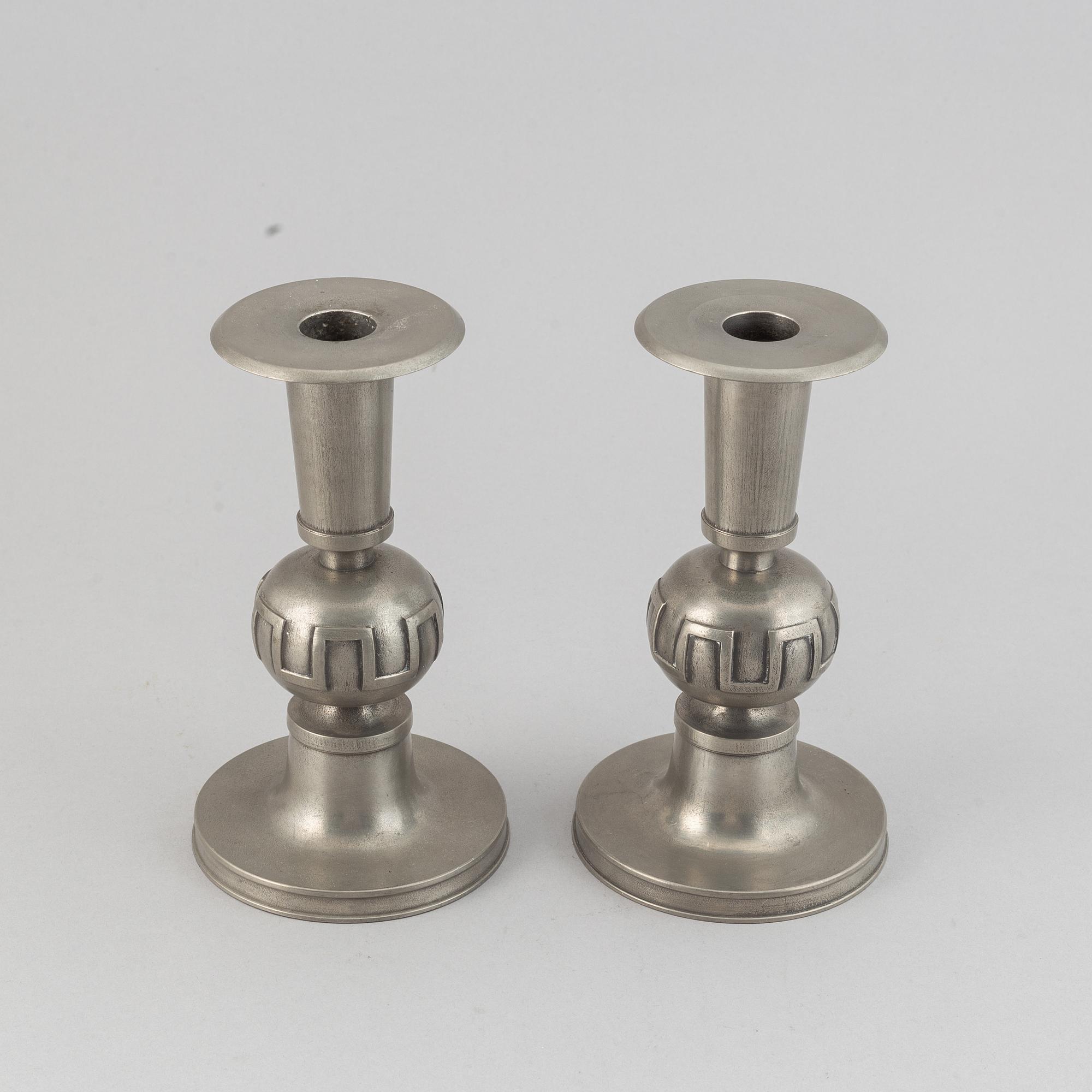 A pair of pewter candle holders by Edvin Ollers, 1952.