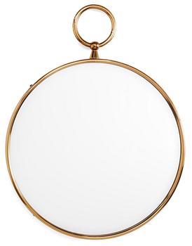 9. A Piero Fornasetti brass mirror, Italy 1950's.