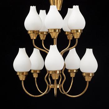 A brass and glass ceiling lamp for ten lights, first half 20th century.
