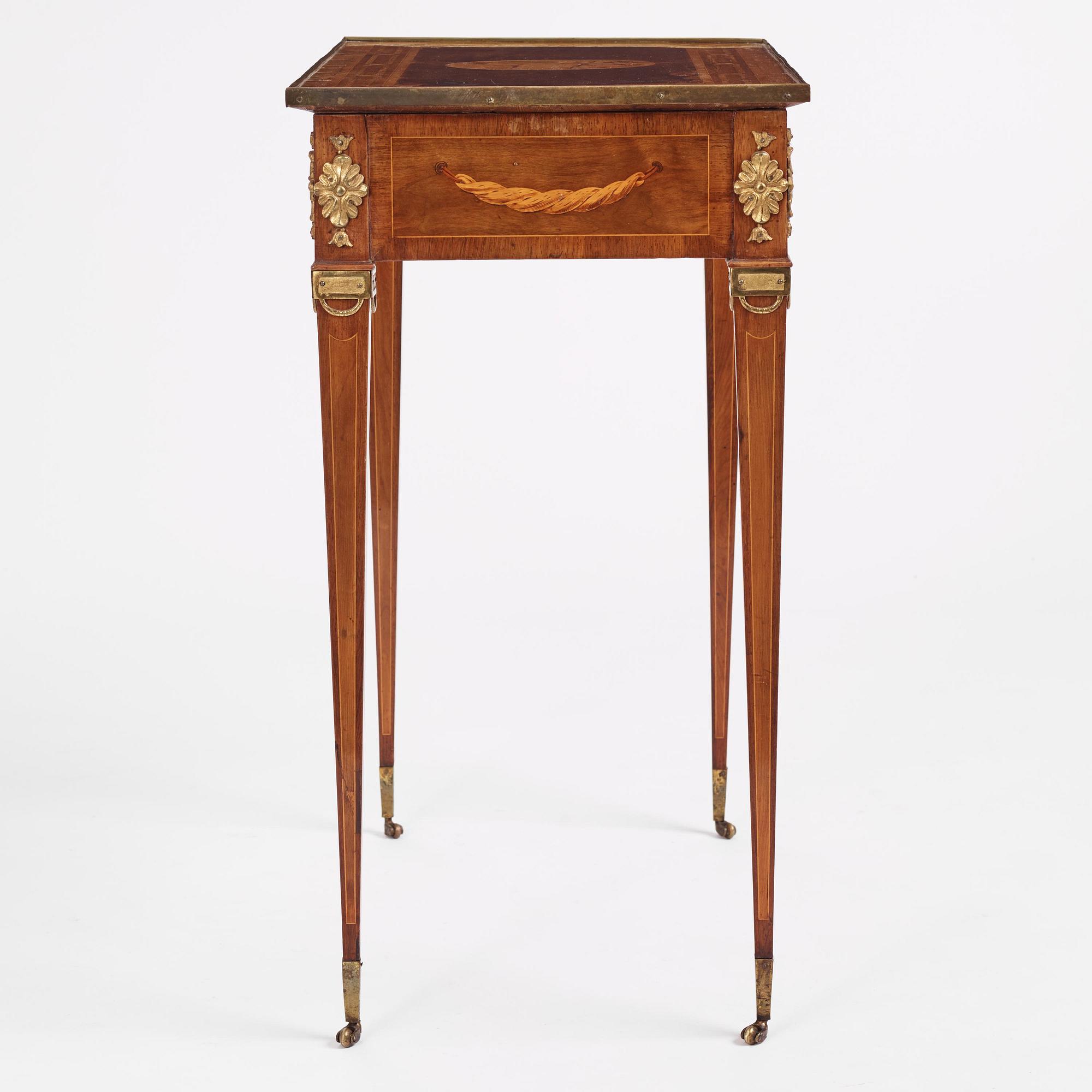 A Gustavian marquetry and gilt brass-mounted table by G. Iwersson (master in Stockholm 1778-1813).