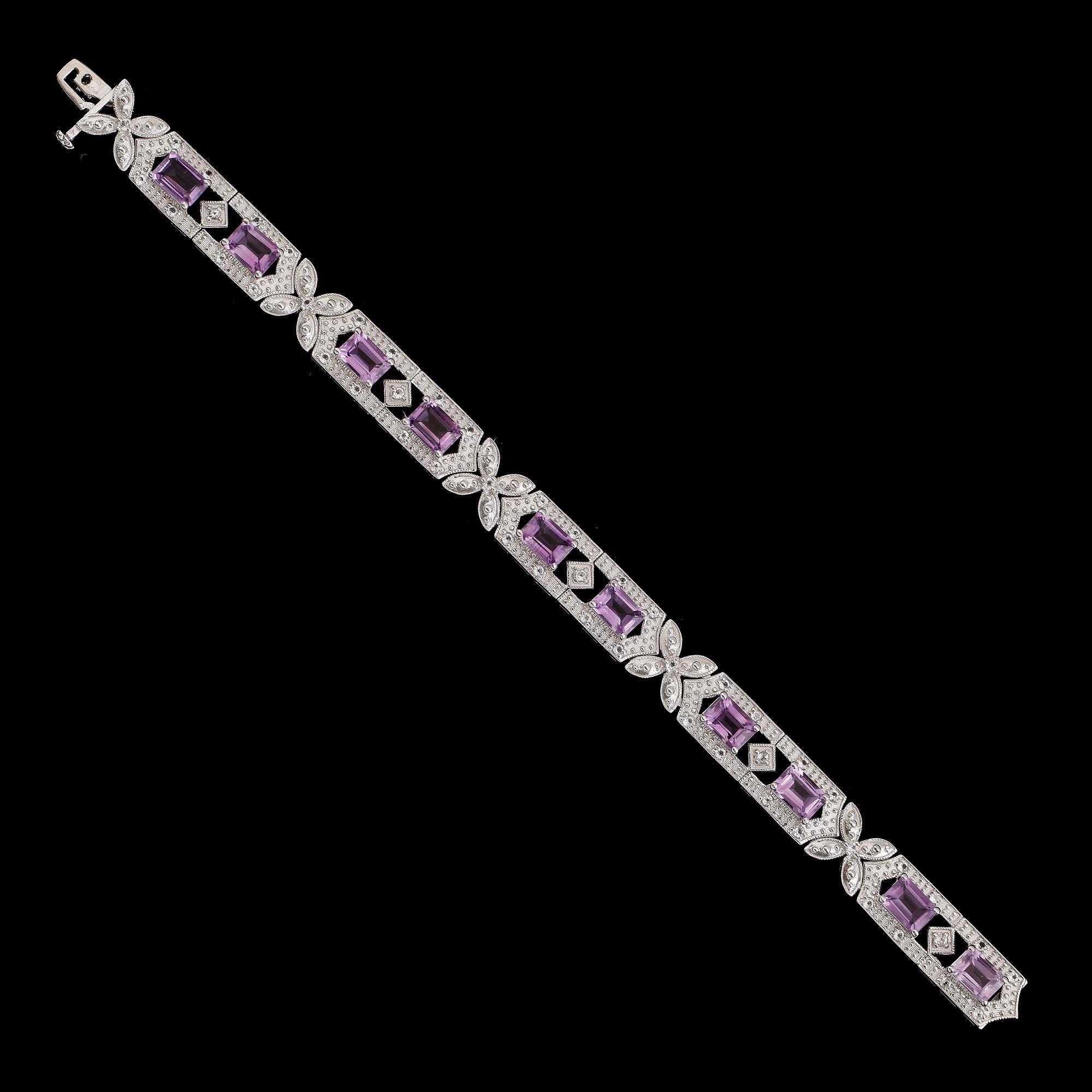 ARMBAND, sterlingsilver, ametister tot ca 11.00 ct, vita topaser tot ca 1.50 ct.