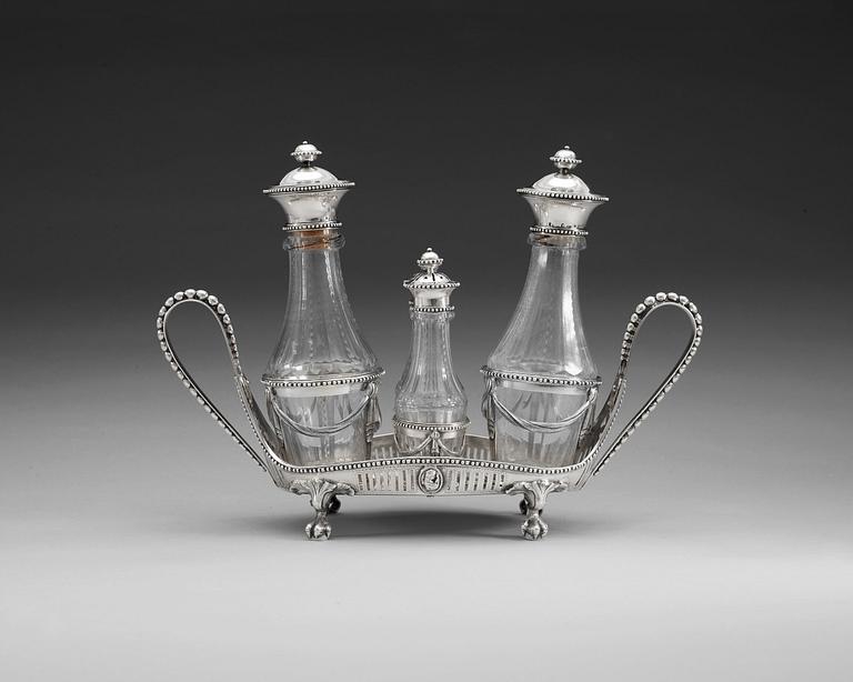 BORDSSURTOUT för fyra flaskor, av Petter Eneroth, Stockholm 1787. Gustaviansk.