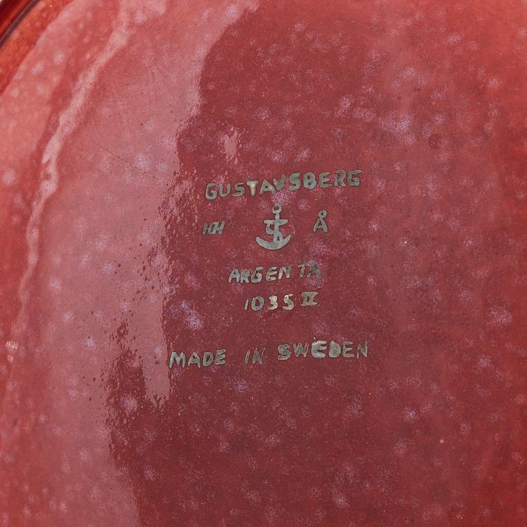 Wilhelm Kåge, a red glazed stoneware 'Argenta' dish, Gustavsberg, Sweden 1956.