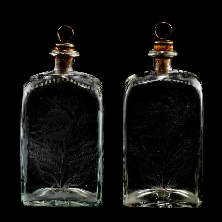 FLASKOR, ett par, glas, 1800/1900-tal.