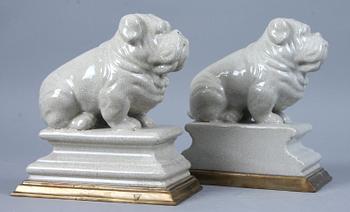 BOKSTÖD, ett par, porslin, 2000-tal.