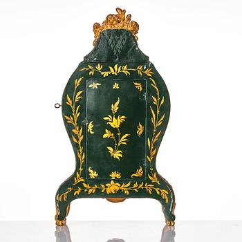 A Swedish rococo mantel clock by N Berg.