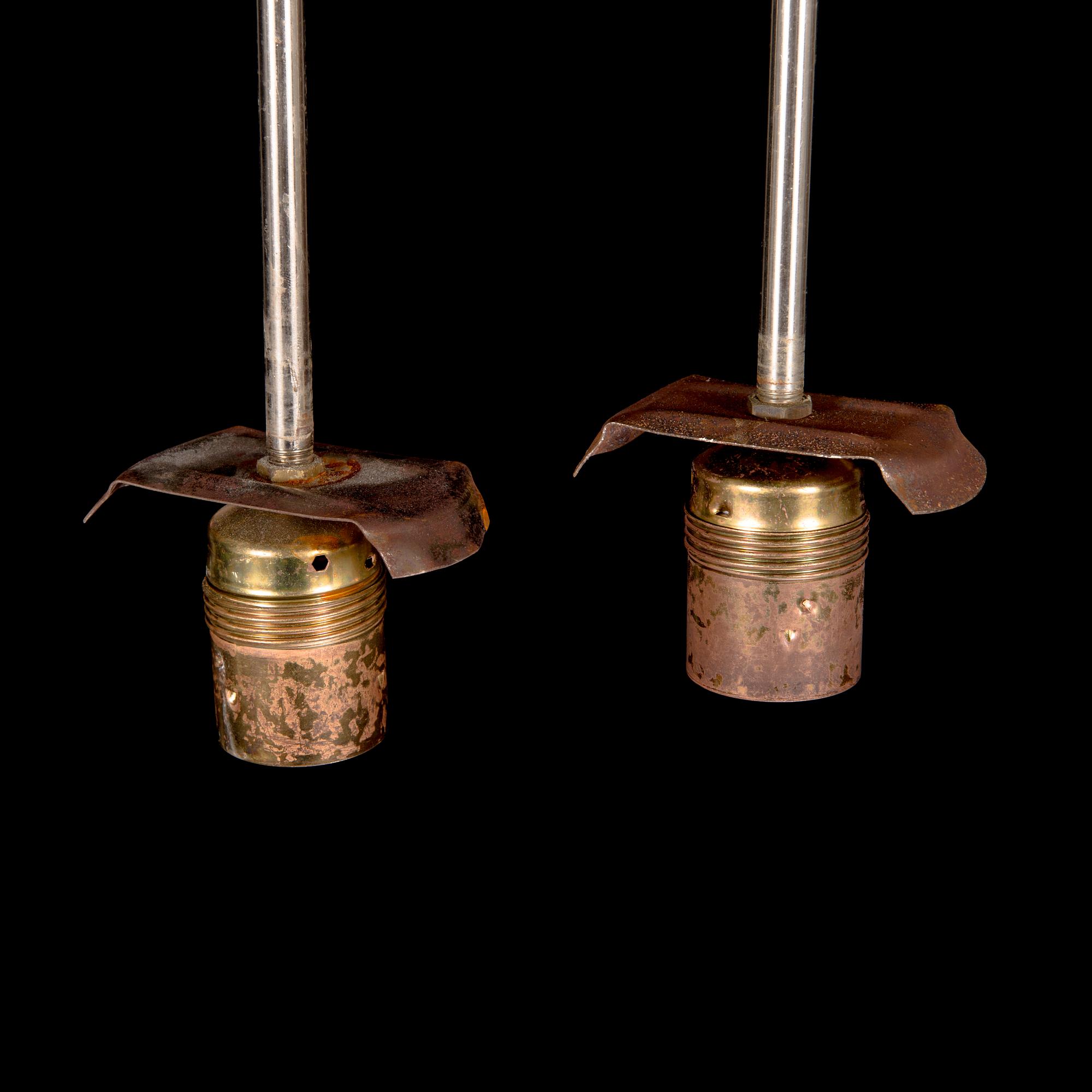 A pair of 1930s pendant lights.