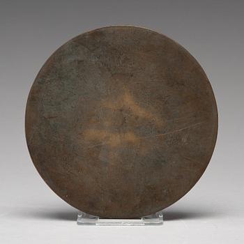 A lion and grapewine bronze mirror, Tang dynasty (618-907).