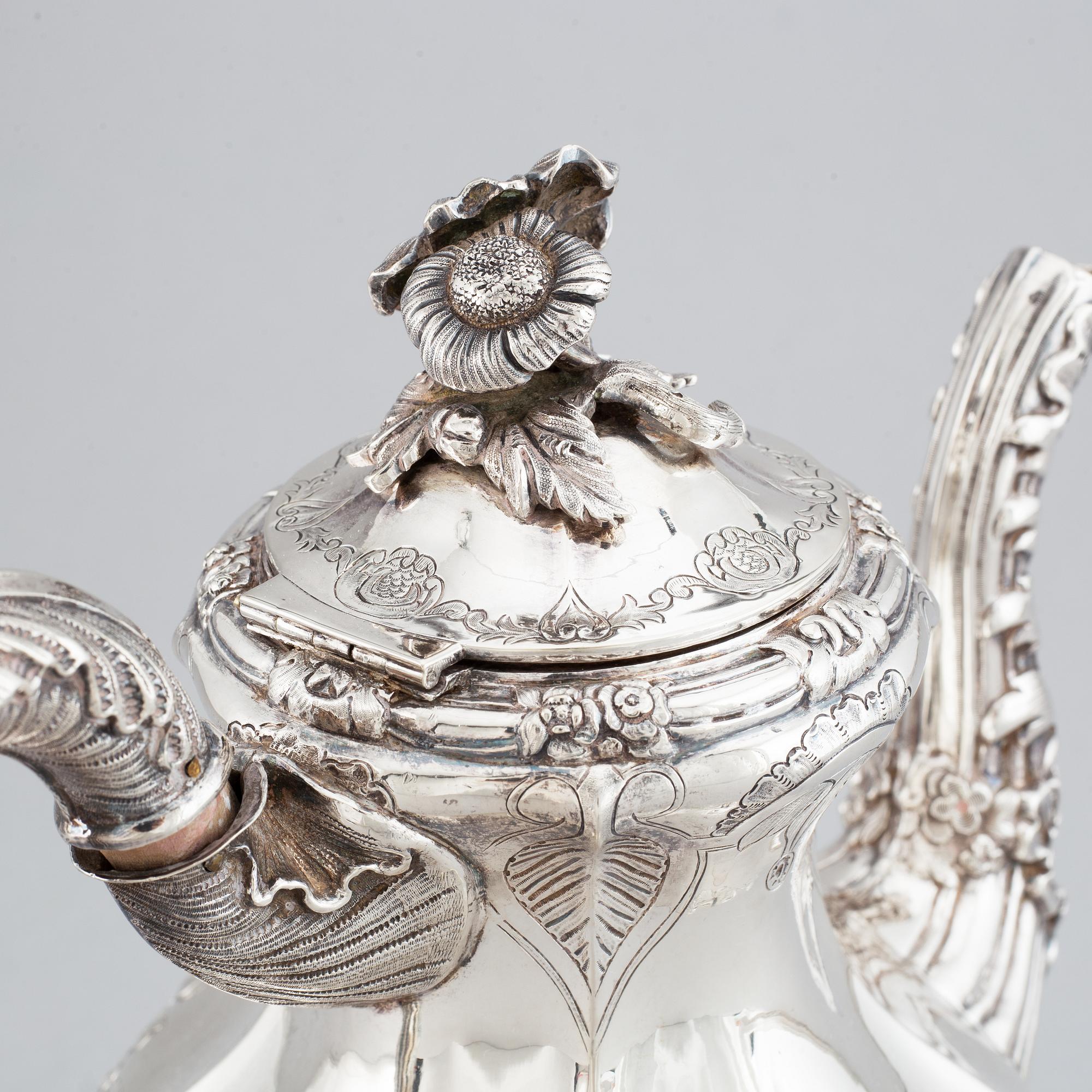 A Swedish rokoko-style silver coffee-pot, mark of Gustaf Theodor Folcker, Stockholm 1848.