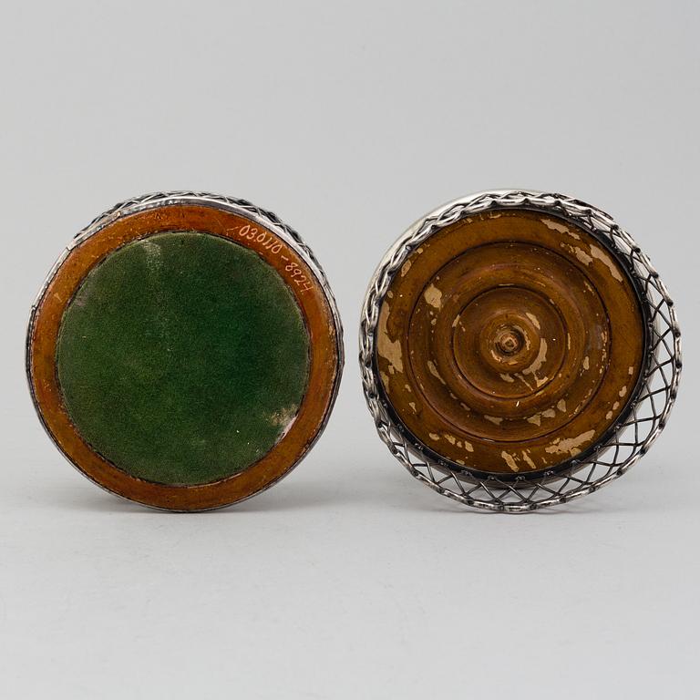 An English pair of 19th century silver plated coasters.