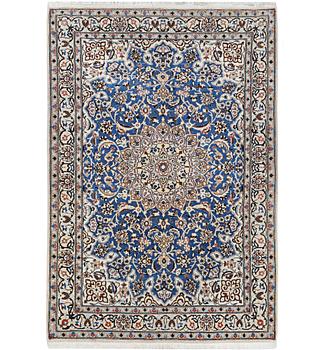 A Nain rug, part silk, c. 190 x 118 cm.