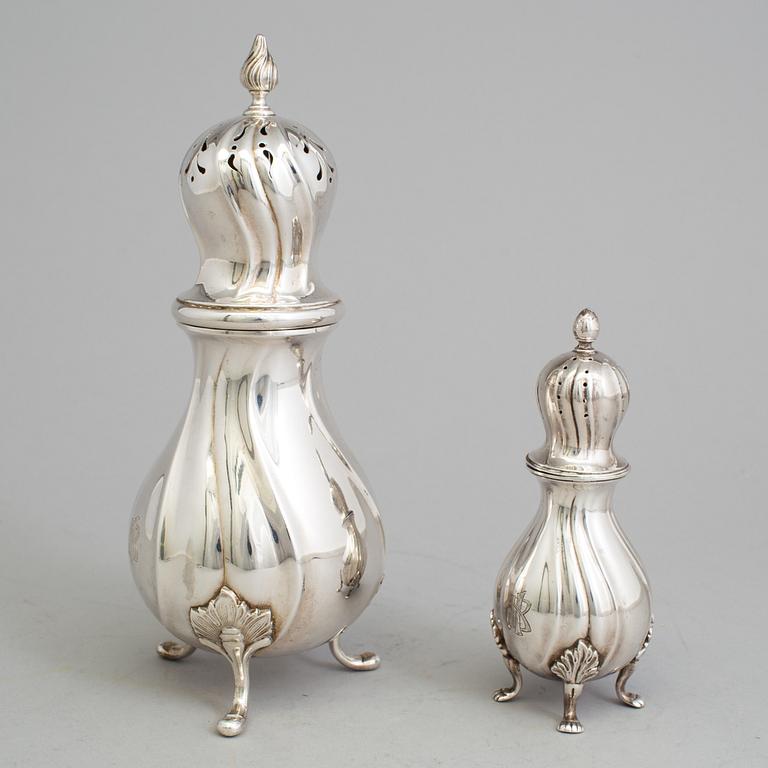 Two 20th century silver casters, one marked CG Hallberg, Stockholm 1938 and one with Swedish import marks.