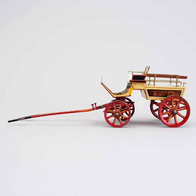 A painted metal horse carriage Germany c 1890-1900.