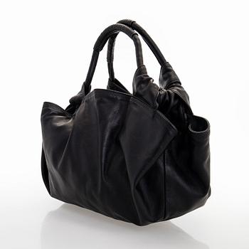 Loewe, a leather handbag.