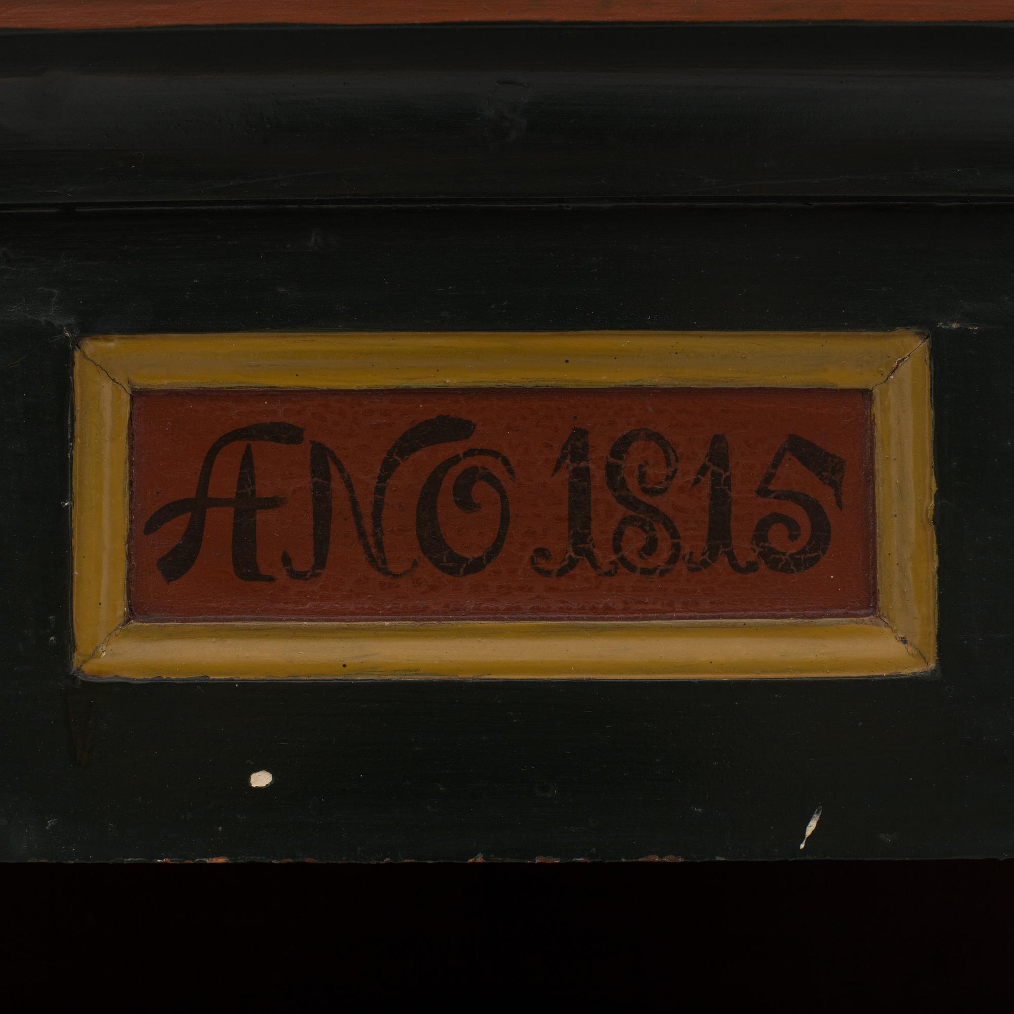 A corner cabinet from the first half of the 19th century.