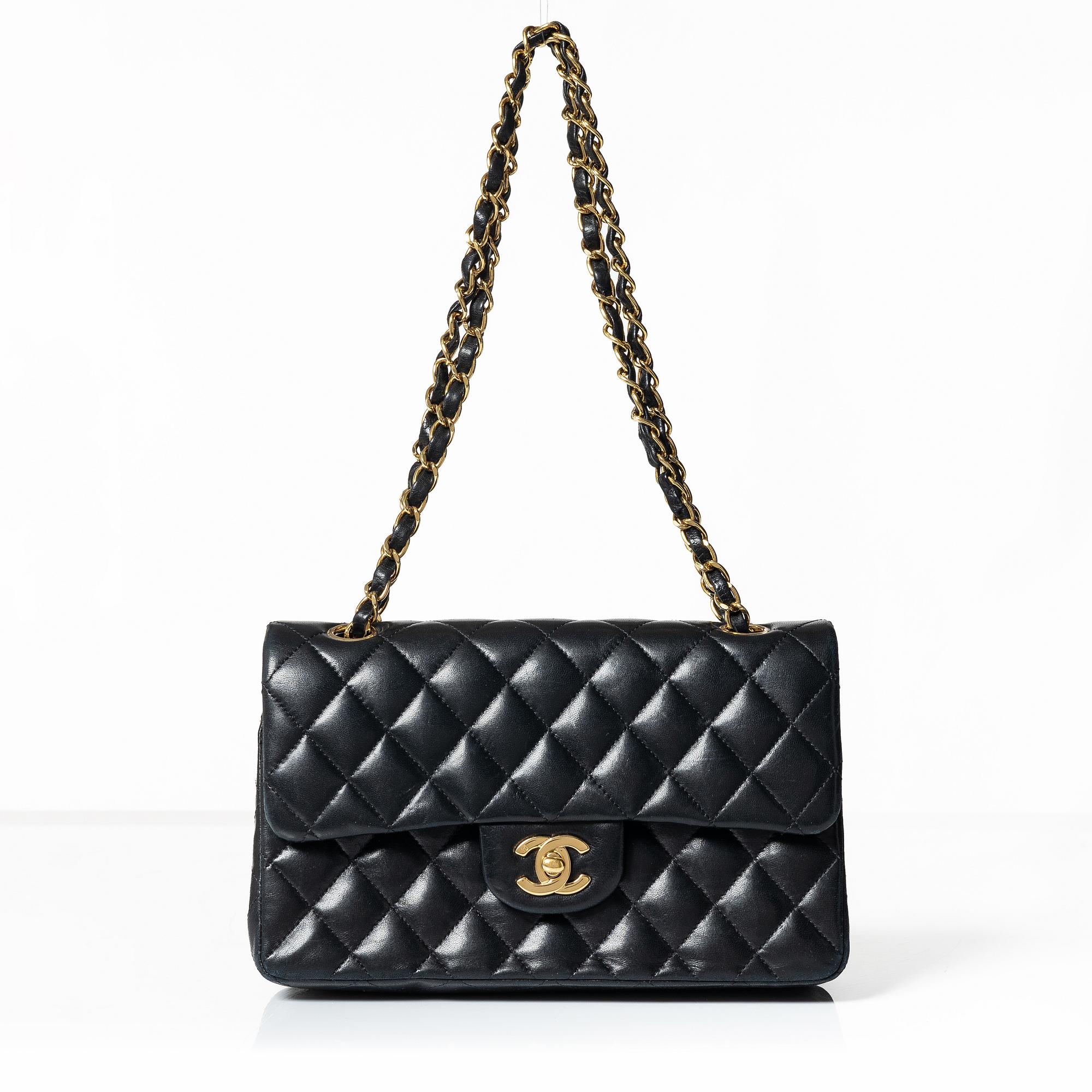 Chanel, A black leather 'Double Flap Bag Small'.