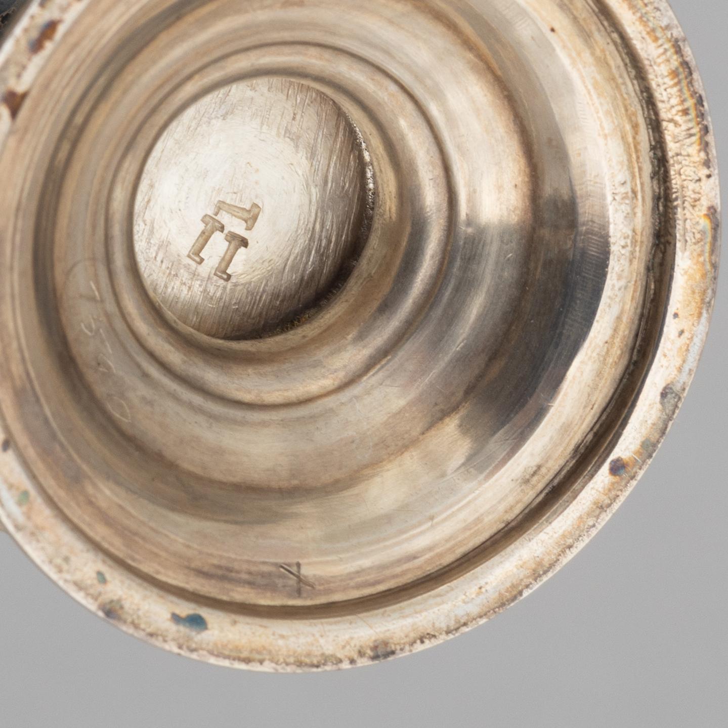 A sugar caster, a salt and pepper shaker, and a snuff-box, silver, including Daniel & John Wellby, London, England 1905.