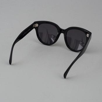 A pair of sunglasses by Céline.