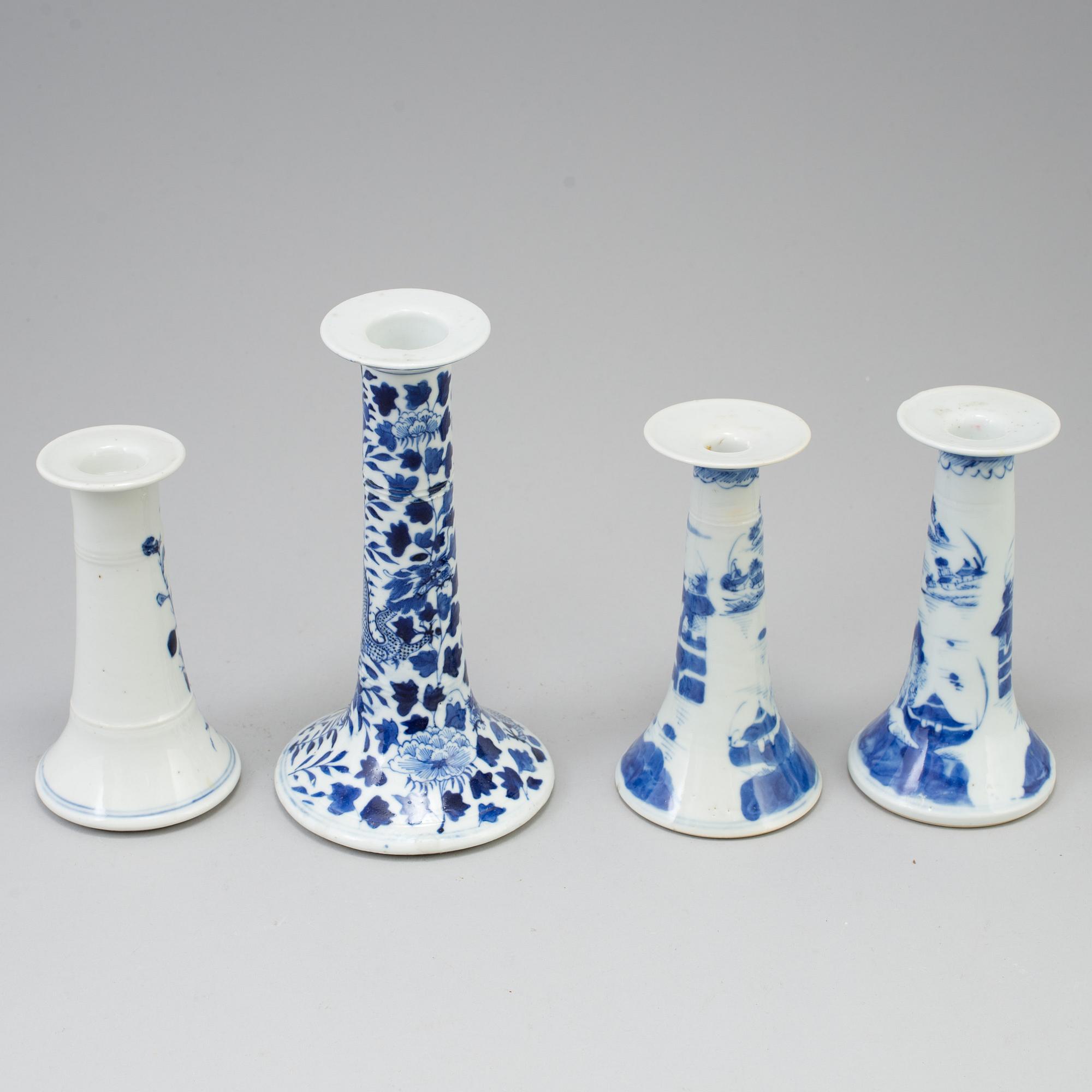 Four chinese 19th century blue and white porcelain candle holders. Qing dynasty.