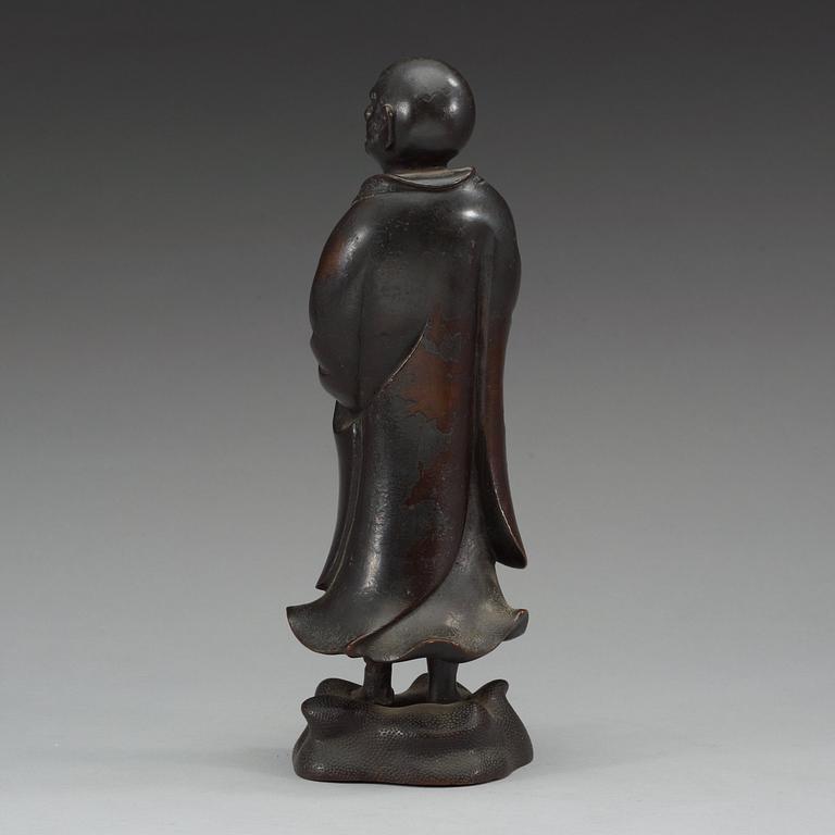 A bronze figure of one of the Lohans, Qing dynasty (1644-1912).