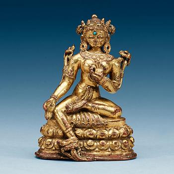 1377. A gilt copper alloy figure of Shyama Tara, Nepal/Tibet, 16th Century or older.