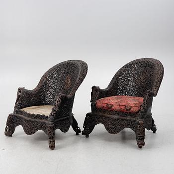 A pair of hardwood chairs, Thailand, 20th century.