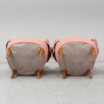 A pair of second half of the 20th Century 'Cirkus' easy chairs by Carl Malmsten.