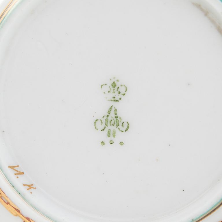 A cup and saucer from the Derzhava service, Imperial Porcelain Manufactory, St. Petersburg, late 19th century.